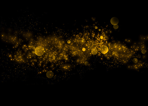 Gold glittering star light and bokeh.Magic dust abstract background element for your product.