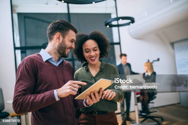 Working Together Towards Customer Satisfaction Stock Photo - Download Image Now - Working, Digital Tablet, Office