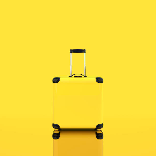 istock Travel suitcase yellow color isolated 938876006