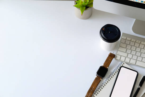 istock Office desk space and supplies. 938880520