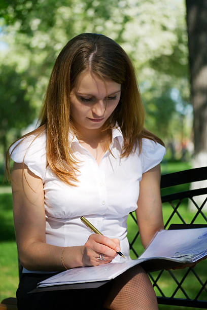 istock Young businesswoman with a folder 93888272