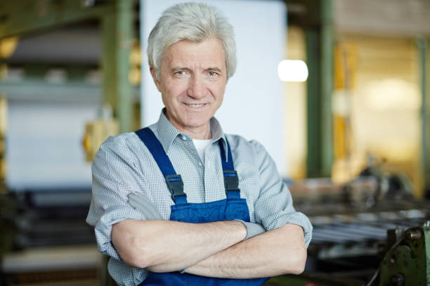 istock Jolly successful foreman in plant shop 938887356