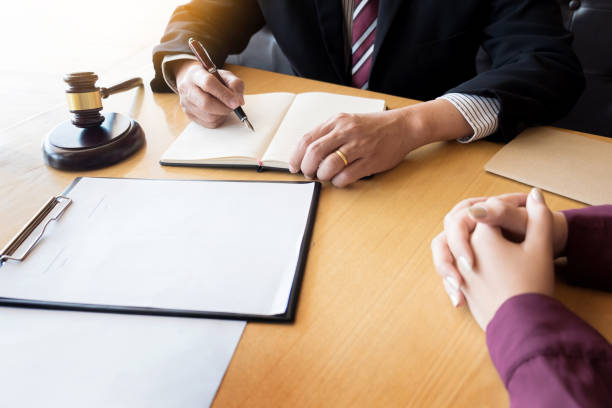 istock High Angle View Of Colleagues Doing Paperwork At Office 938887968