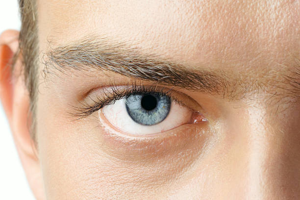 Man's eye  blue eyes stock pictures, royalty-free photos & images
