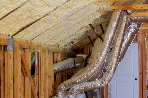 istock Open AC Heating Vent and Tubing in Ceiling of New Home Construction. 938914280