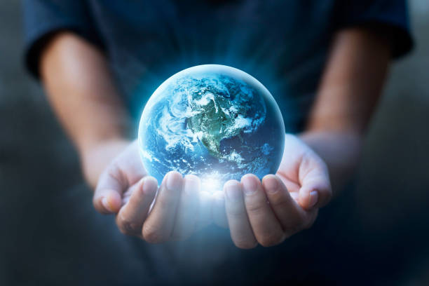 earth day, human hands holding blue earth, save earth concept. elements of this image furnished by nasa - environment nature water globe imagens e fotografias de stock