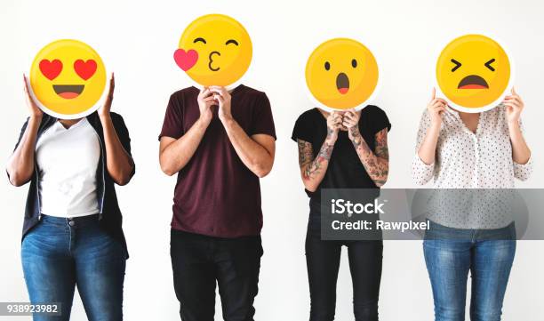 Diverse People Holding Emoticon Stock Photo - Download Image Now - Emoticon, Emotion, Social Media