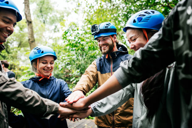 Team building outdoor in the forest stock photo
