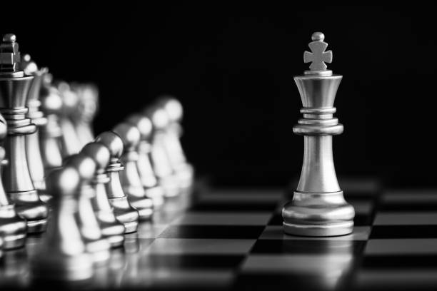 istock Strategy chess battle Intelligence challenge game on chessboard. Success the strategy concept. Chess business leader and success idea. Chess strategy game business competition success play. 938931874
