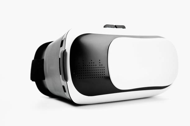 istock Close Up of VR is a virtual reality simulator helmet on white background. 938944470