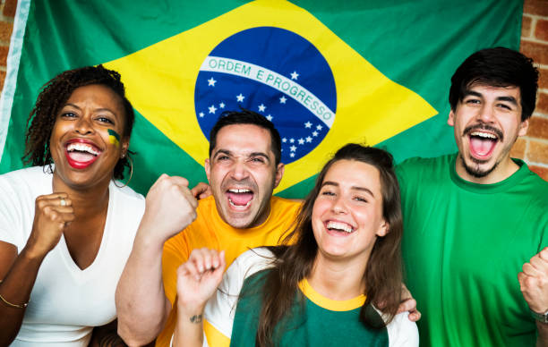 istock Friends cheering world cup with painted flag 938944894