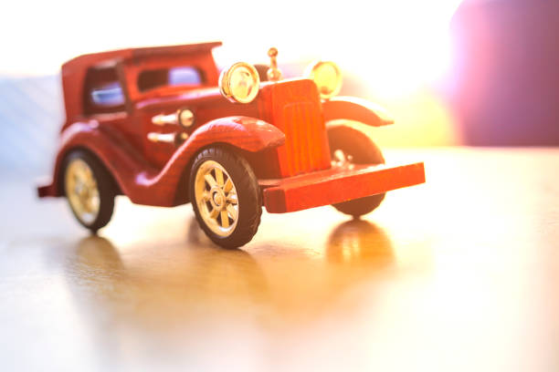 istock ancient wooden car on the table.transportation concept. 938949798
