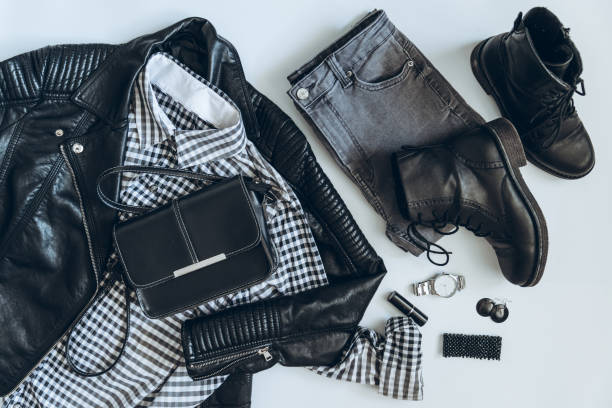 istock woman clothes flat lay. overhead view. black white concept 938958816