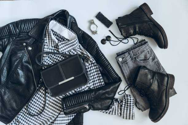 istock woman clothes flat lay. overhead view. black white concept 938958868