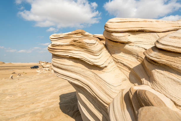 Fossil Dunes at Al Wathba on the outskirts of Abu Dhabi in the United Arab Emirates are a series of around 100 small outcrops of compressed sand that have formed into soft, friable sandstone