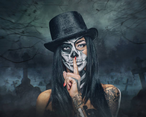 A woman with skull make up. stock photo