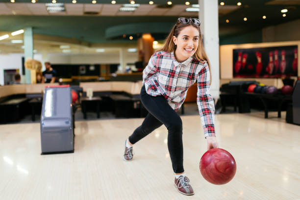 istock Beautiful woman bowling 938976956