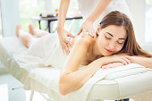 Leisure background, Beautiful girl is relax smile by handle massage, luxury spa Health and Beauty Background.