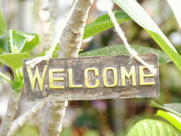 istock welcome sign hanging in the garden 938978186