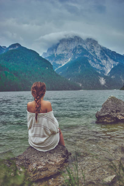 istock Lady at the lake 938980634
