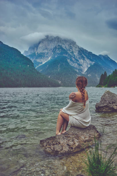 istock Lady at the lake 938981036