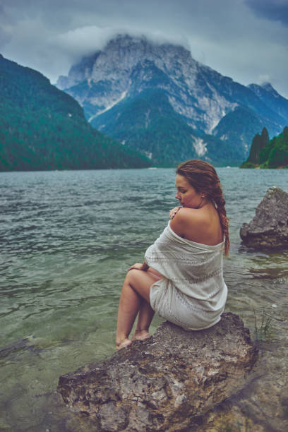 istock Lady at the lake 938981264