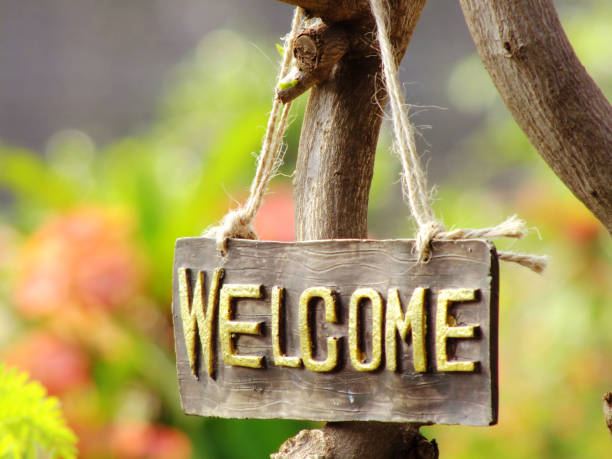 istock welcome sign hanging in the garden 938981302