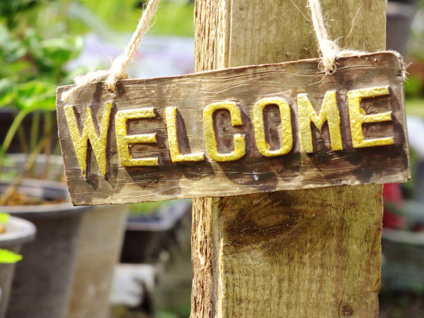 istock welcome sign hanging in the garden 938981516