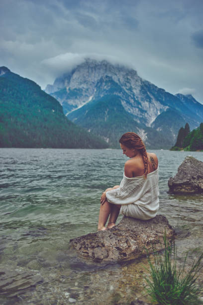 istock Lady at the lake 938981672