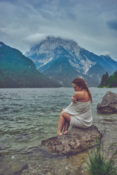 istock Lady at the lake 938981734