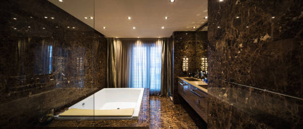 istock Elegant and spacious marble bathroom 938982220