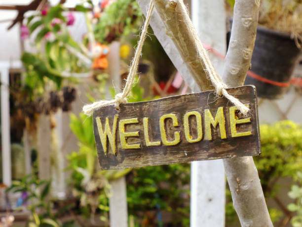 istock welcome sign hanging in the garden 938982252