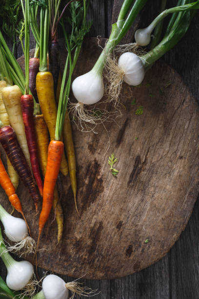 istock New Onions and Colorful Carrots, Spring Vegetables 938982384