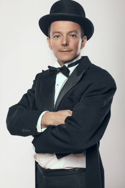 istock Man in black tuxedo and cylinder hat. 938982688