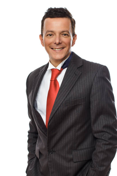 istock Smilling man in grey suit and red tie. 938986074