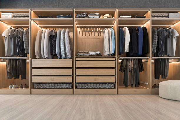 istock 3d rendering modern scandinavian white wood walk in closet with wardrobe near window 938987464