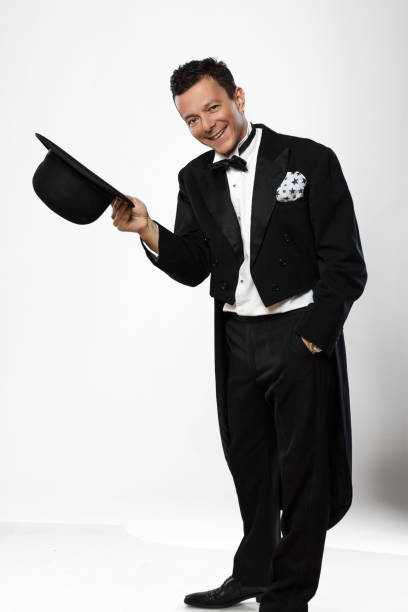istock Man in black tuxedo and cylinder hat. 938987488