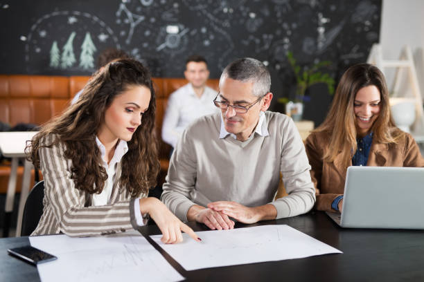 istock Busines meeting and work in a cafe 938989772