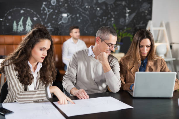 istock Busines meeting and work in a cafe 938989978
