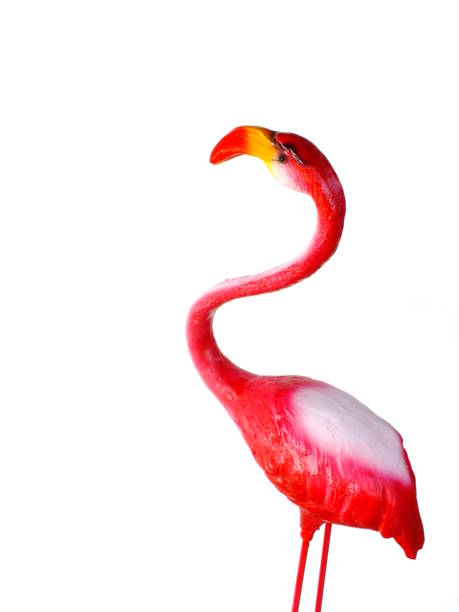 istock pink ceramic flamingo figures with white background 938994706