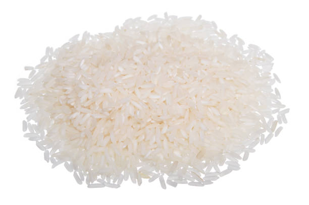 istock Heap of white rice isolated on white background 938995092