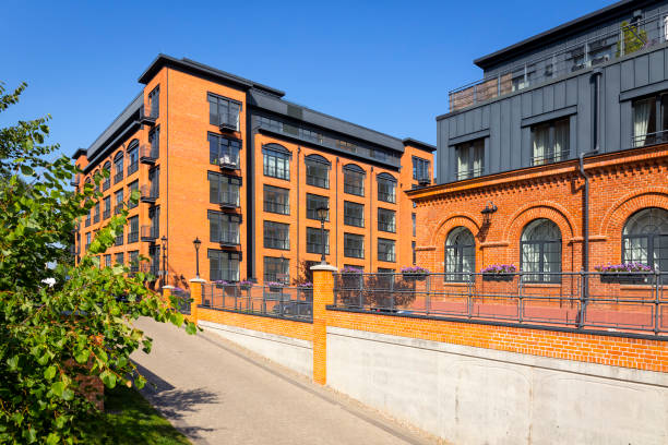 istock The old textile factory converted into a apartment buildings complex 938998914
