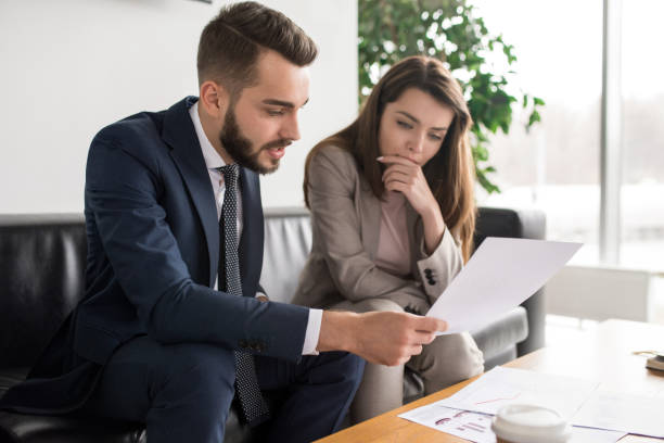 istock Two Modern Business People in Meeting 939005278