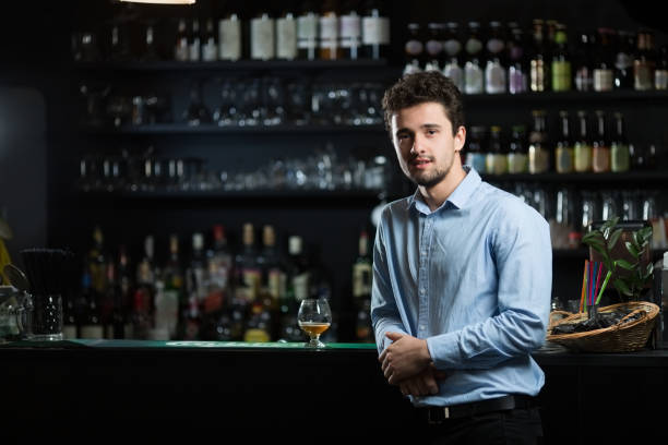 istock Young businessman at bar counter 939006040