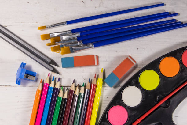 istock Set of drawing tools on white wooden background 939006110