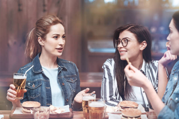 istock Beautiful good looking woman telling a story 939010440