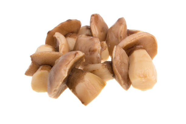 istock Mushrooms canned on a white background 939010922