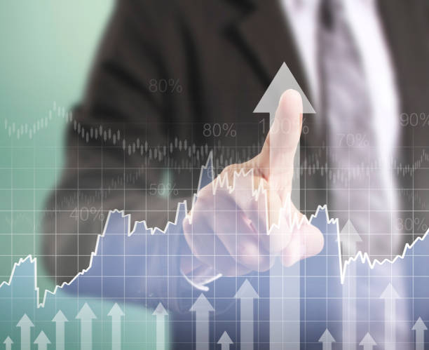 istock financial symbols coming from hand 939013390