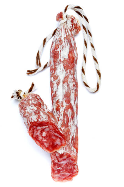 istock Dried organic salami sausage on white background 939014500