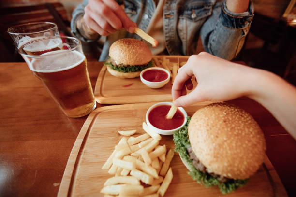 istock Couple having dinner in a local pub 939017702